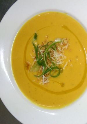 A picture of Creamy gingered Kumara (sweet potato) soup with toasted coconut.