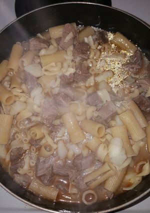 A picture of Beef potatoes and noodles.