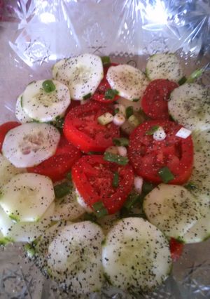 A picture of Cucumber & tomato salad.
