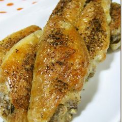 A picture of Crunchy-Skinned Chicken Wings on the Grill.