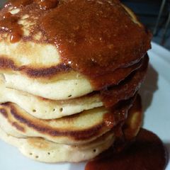 A picture of Softest and Fluffy Pancake stacked high with Caramel.