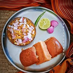 A picture of Spicy and Tasty Kolhapuri Misal Paav.