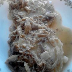 A picture of Open Faced Chicken n Gravy sandwich w/ Mashed Tators.
