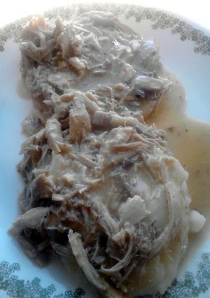 A picture of Open Faced Chicken n Gravy sandwich w/ Mashed Tators.