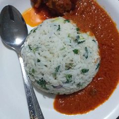 A picture of Vegetable rice with stew.