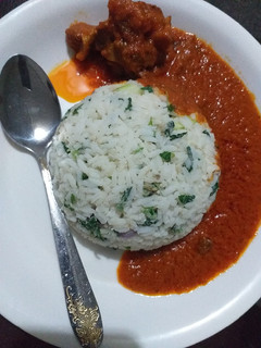 A picture of Vegetable rice with stew.