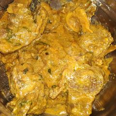 A picture of Mutton in walnut Apple gravy.