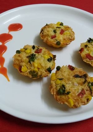 A picture of Veg. Handva cupcakes.