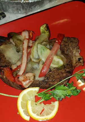 A picture of Baked swiss cheese steak.