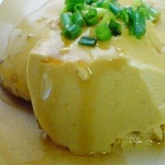 A picture of Egg Tofu with Soy Milk In a Bowl.