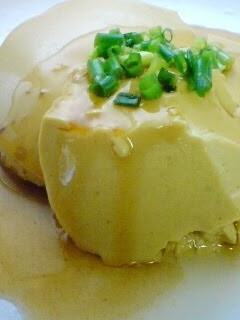 A picture of Egg Tofu with Soy Milk In a Bowl.
