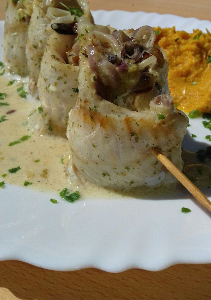 Una foto de Filet de merluza con puré mixto