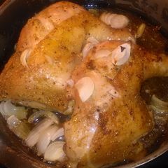 A picture of Roasted chicken leg quarters.