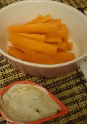 A picture of Carrots with honey yogurt dip.