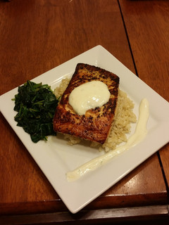 A picture of Pan seared lemon pepper salmon w/ citrus yogurt sauce.