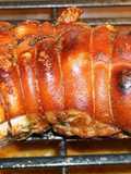 Pernil de cerdo deshuesado asado al horno