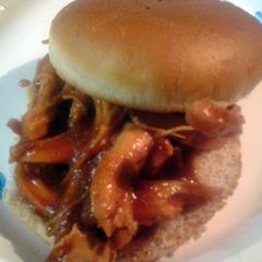 A picture of Leftover chicken shredded in batch88 barbecue sauce.