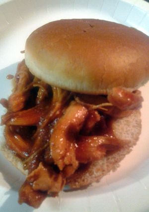 A picture of Leftover chicken shredded in batch88 barbecue sauce.