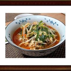 A picture of Yyukhoejang Gukbap - Korean soup.