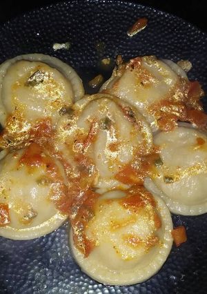 Una foto de Sorrentinos de calabaza, nueces y mozzarella