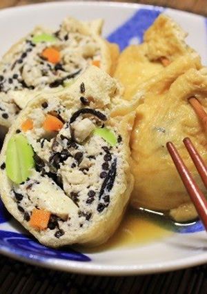 A picture of Simmered Gomoku (Five-Ingredient) "Kinchaku" Pouches Stuffed with Tofu and Ground Chicken.