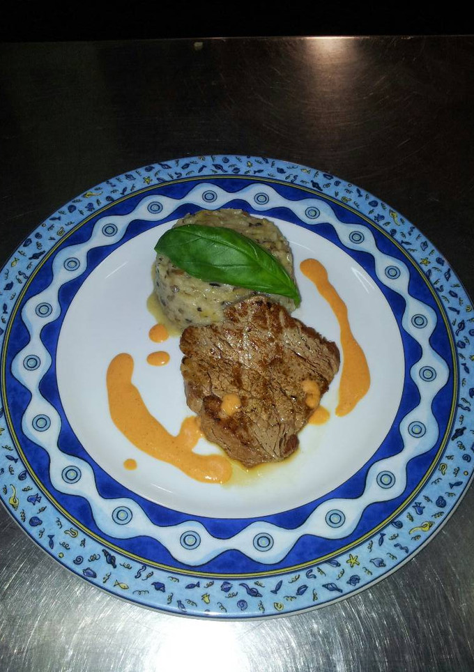 Una foto de Risotto con solomillo