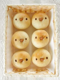 A picture of Bread Rolls with Birdie Faces.