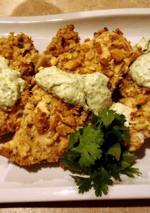 A picture of Baked chicken, crispy style with green goddess dressing.