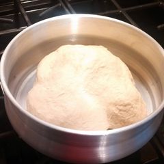 A picture of New York style pizza dough.