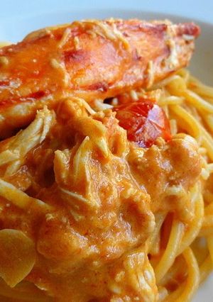 A picture of Tomato Pasta with King Crab.