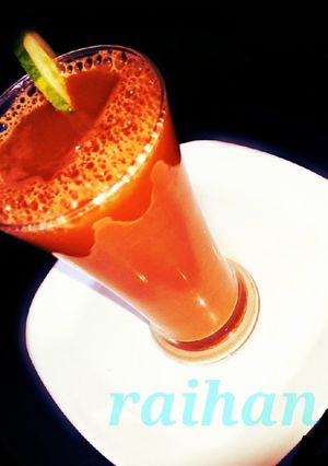 A picture of Watermelon and carrot juice.