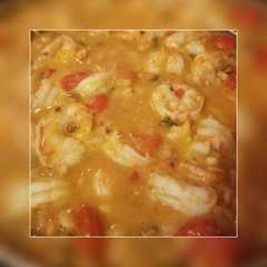 Una foto de Camarones con frijoles cannellini estilo Toscano