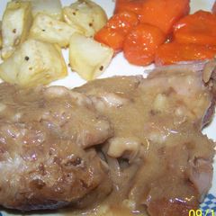 A picture of Pork Pot Roast Roasted Potatoes & Candied Carrots.
