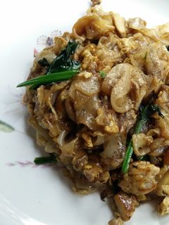 รูปของ ผัดซีอิ๊วไก่ กับปวยเล้ง