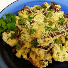 A picture of Roasted Cauliflower with Kalamata & Artichoke Vinaigrette.