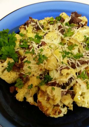 A picture of Roasted Cauliflower with Kalamata & Artichoke Vinaigrette.