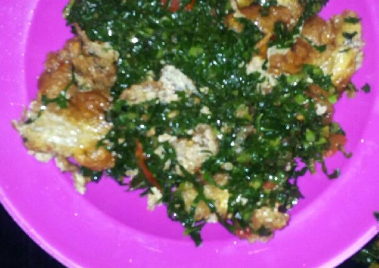 Fried eggs and sukuma wiki