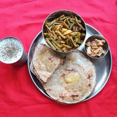 A picture of Garlic Masala Rotlo With French Beans Subji (Gujarati).