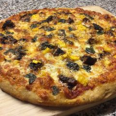 A picture of Jerk Chicken Mango Pizza.