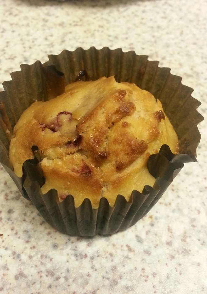A picture of Raspberry and white chocolate muffins.
