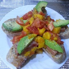 A picture of Mango salsa avocado and spam tapa.