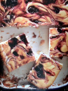 A picture of *Blueberry Swirl Cheesecake Bars*.