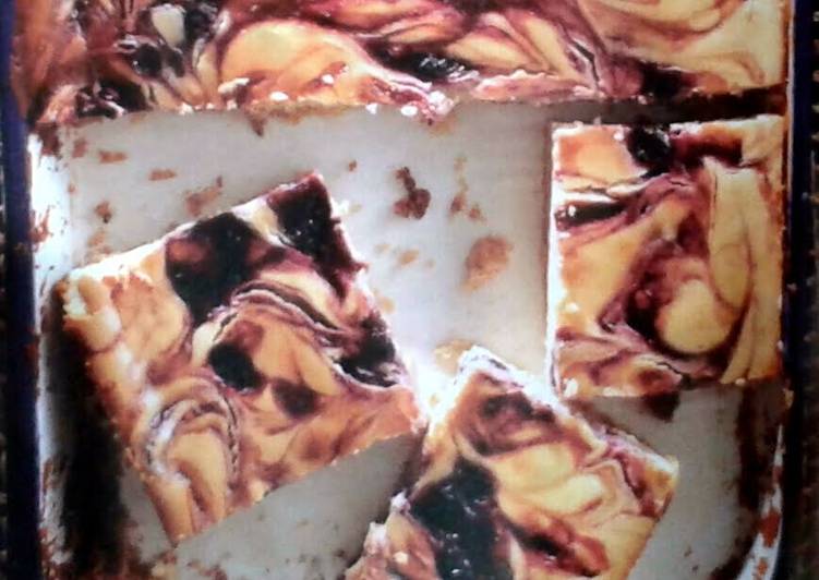 Recipe of Ultimate Blueberry Swirl Cheesecake Bars