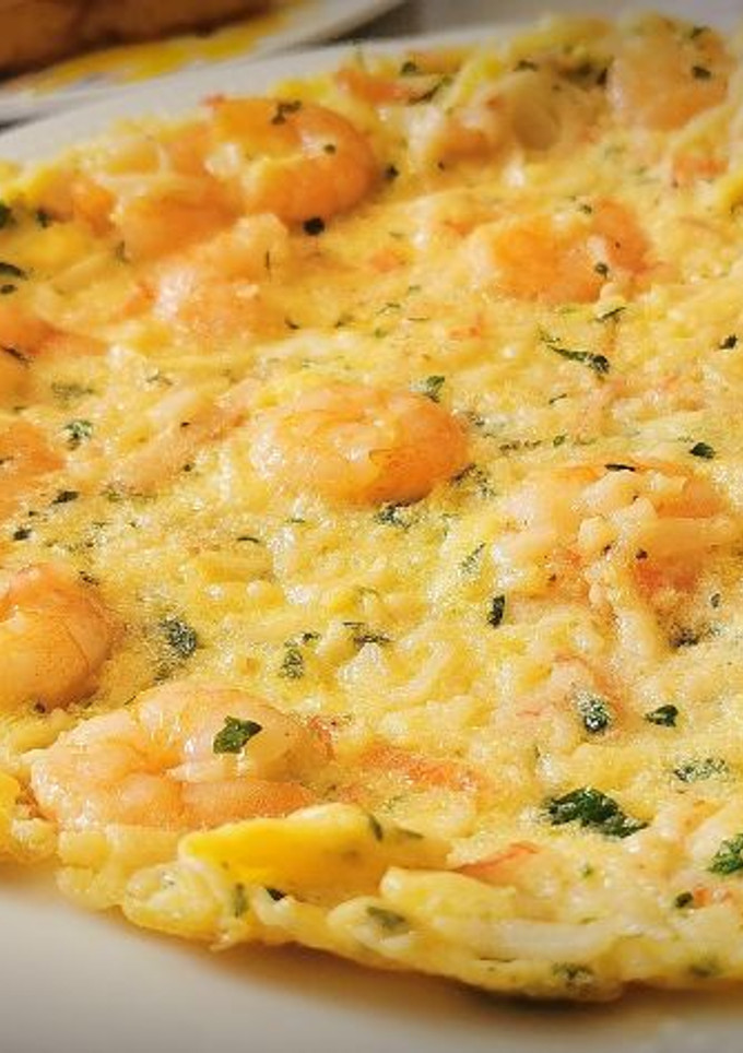 Una foto de "Tortilla vaga" de Langostinos y Chatka