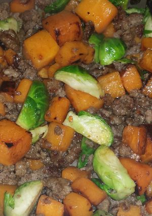 A picture of Butternut squash, Brussel sprout sausage mixture.