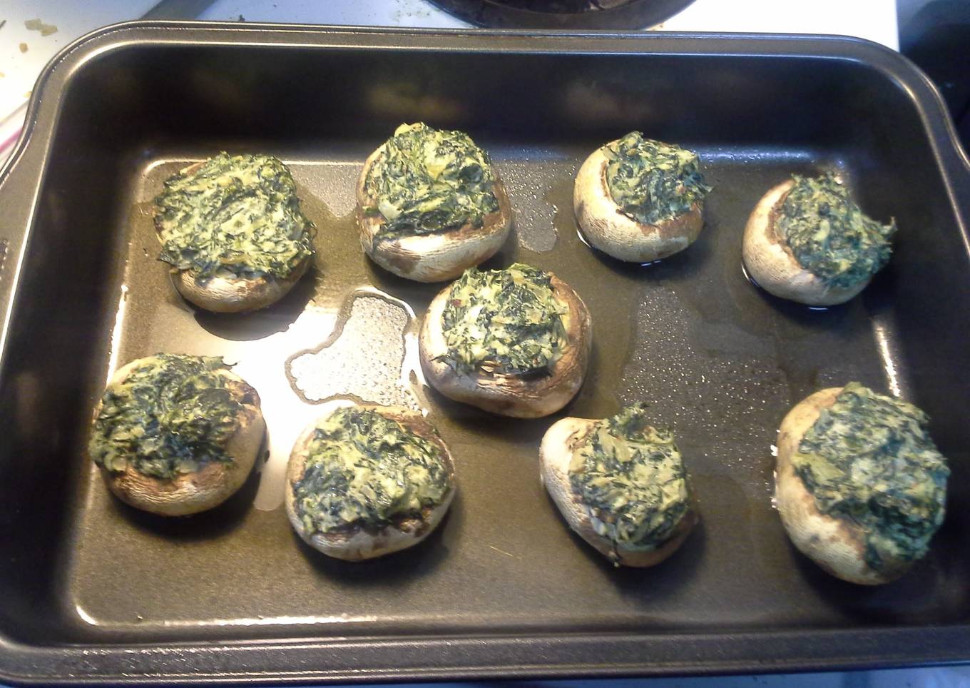 Mushrooms stuffed with spinich and onions
