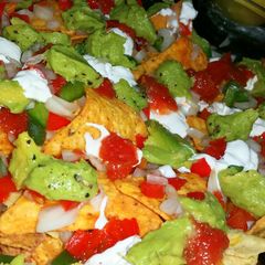 A picture of Crispy crunchy colourful nachos.