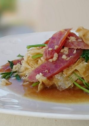 A picture of Chinese Sausage And Beancurd Skin In Chicken Broth.
