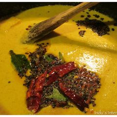 A picture of Moru Kootan (Yoghurt and coconut curry).