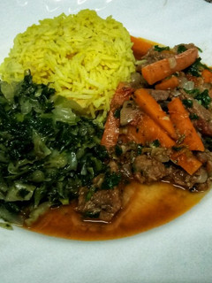 A picture of Mboga checked, beef stew and tumeric rice.